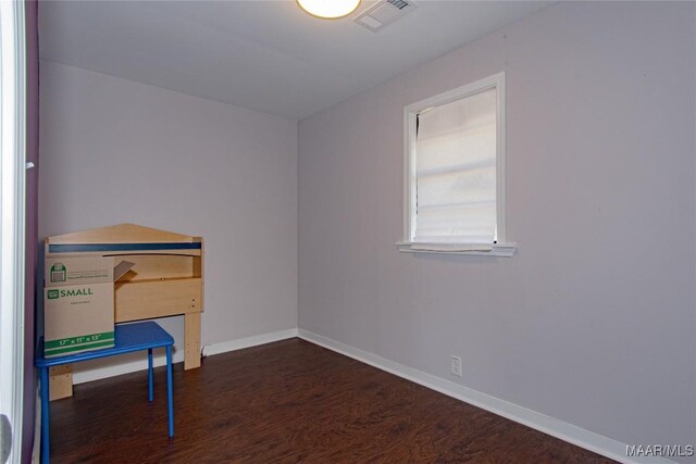 25882 Troy Hwy, Grady, AL 36036 - interior space featuring visible vents, baseboards, and wood finished floors
