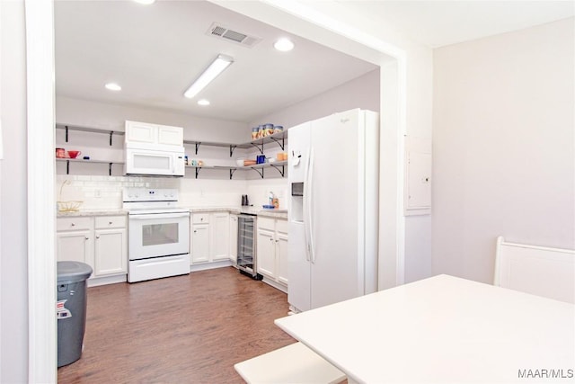 25882 Troy Hwy, Grady, AL 36036 - kitchen featuring visible vents, wine cooler, light countertops, white appliances, and open shelves