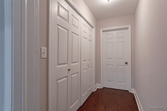 25882 Troy Hwy, Grady, AL 36036 - hallway featuring dark wood finished floors and baseboards