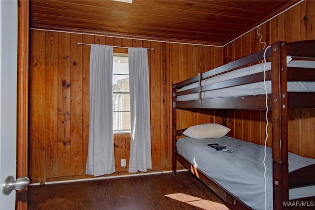 25882 Troy Hwy, Grady, AL 36036 - unfurnished bedroom featuring wood finished floors, wooden walls, multiple windows, and wood ceiling
