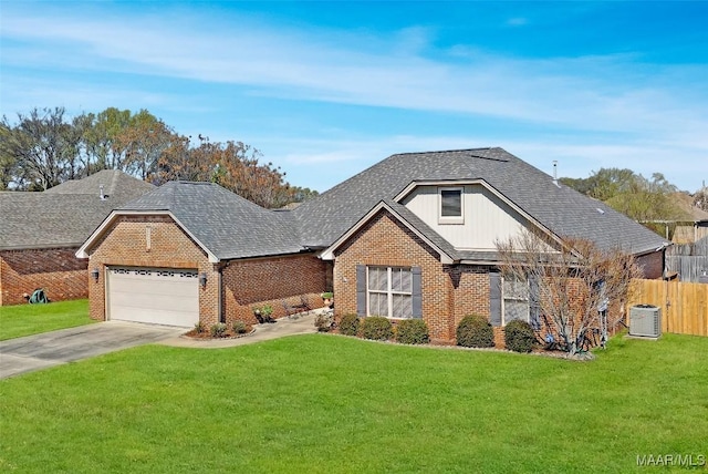 view of front facade with concrete driveway, an attached garage, a front yard, brick siding, and central AC unit