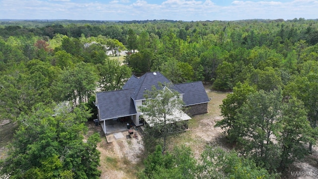 drone / aerial view with a forest view