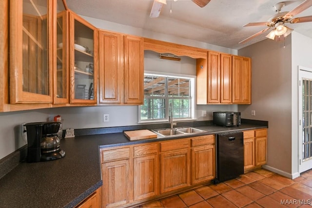2011 Glenforest Dr, Prattville, AL 36067 - kitchen featuring dark countertops, glass insert cabinets, dishwasher, a ceiling fan, and a sink