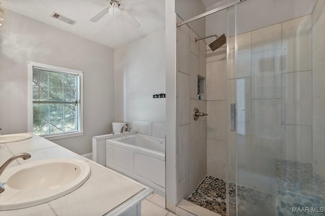 2011 Glenforest Dr, Prattville, AL 36067 - bathroom with a stall shower, a ceiling fan, visible vents, and a sink
