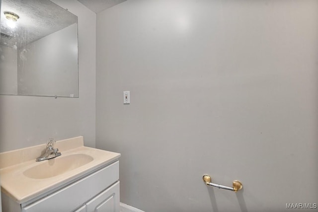 2011 Glenforest Dr, Prattville, AL 36067 - bathroom featuring vanity and a textured ceiling