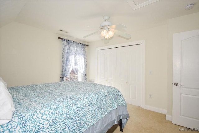74 Lake Point Dr, Jacksons Gap, AL 36861 - bedroom featuring visible vents, a closet, baseboards, light colored carpet, and ceiling fan