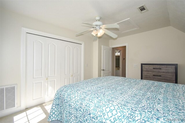 74 Lake Point Dr, Jacksons Gap, AL 36861 - bedroom with a closet, visible vents, lofted ceiling, and a ceiling fan