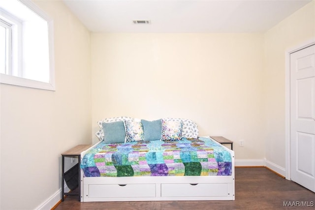74 Lake Point Dr, Jacksons Gap, AL 36861 - bedroom with visible vents, baseboards, and wood finished floors