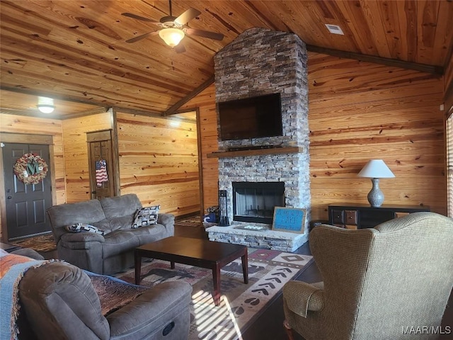 2085 Robinson Pond Rd, Prattville, AL 36067 - living area featuring a fireplace, wooden ceiling, wooden walls, and a ceiling fan