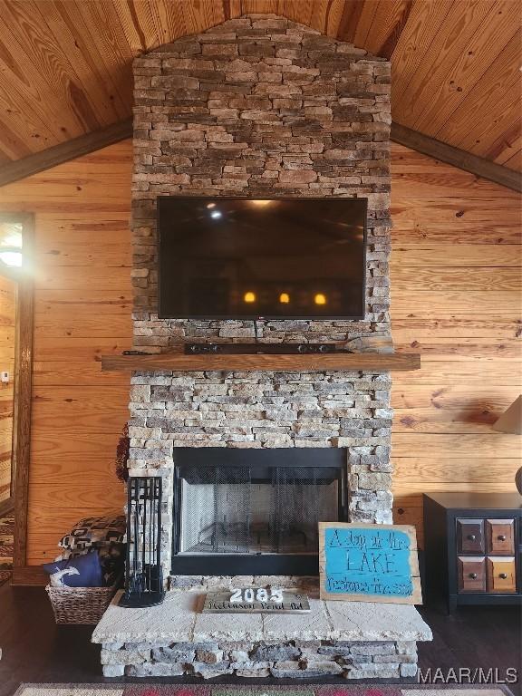 2085 Robinson Pond Rd, Prattville, AL 36067 - room details featuring a stone fireplace, wooden ceiling, and wooden walls