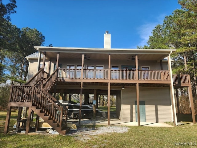 2085 Robinson Pond Rd, Prattville, AL 36067 - rear view of house with stairs, a wooden deck, ceiling fan, a chimney, and a patio area