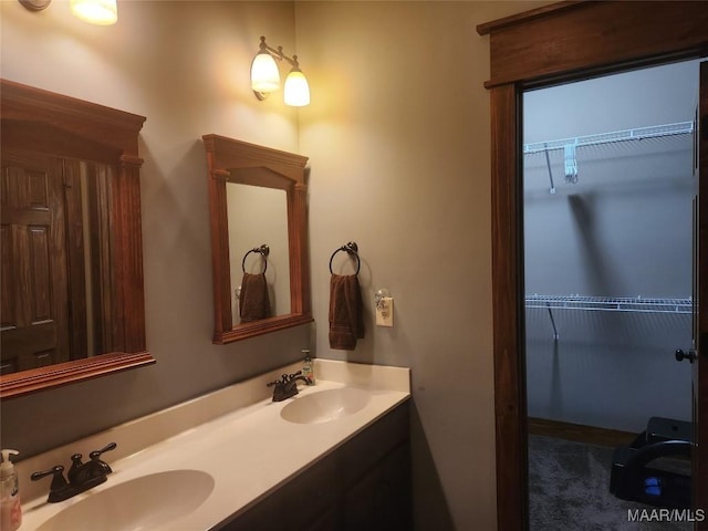 2085 Robinson Pond Rd, Prattville, AL 36067 - full bathroom with a sink, a spacious closet, and double vanity