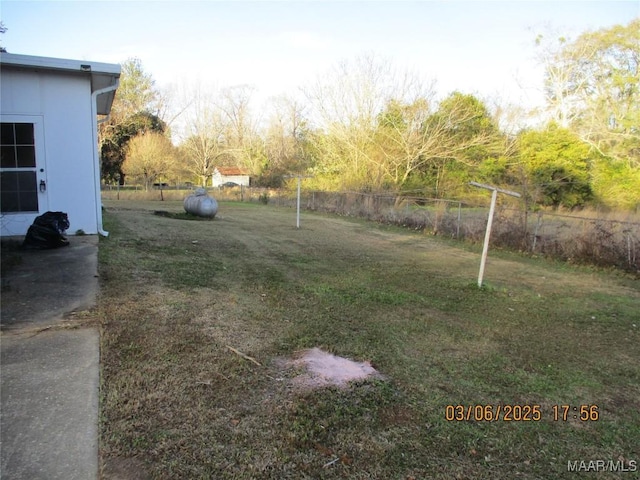 view of yard featuring fence