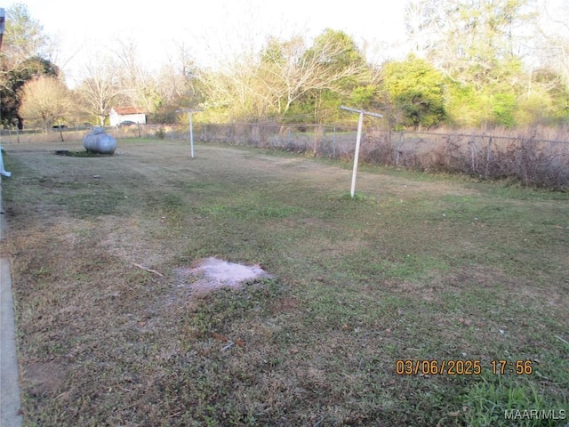 view of yard with fence