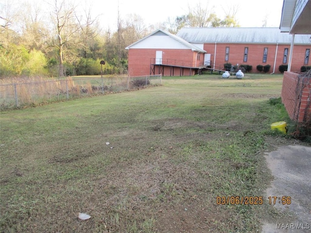 view of yard featuring fence