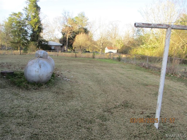 view of yard with fence