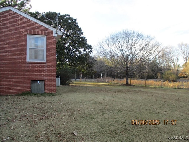 view of yard with central AC