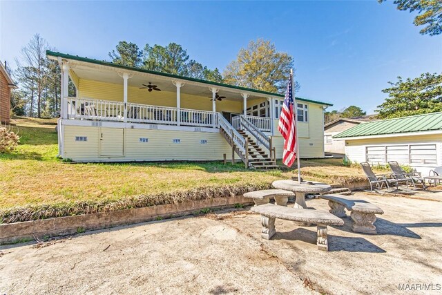 100 Royal Dr, Equality, AL 36026 - view of front of home with a patio area, a front yard, stairs, and ceiling fan