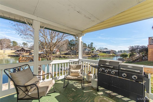 100 Royal Dr, Equality, AL 36026 - view of patio / terrace with a water view