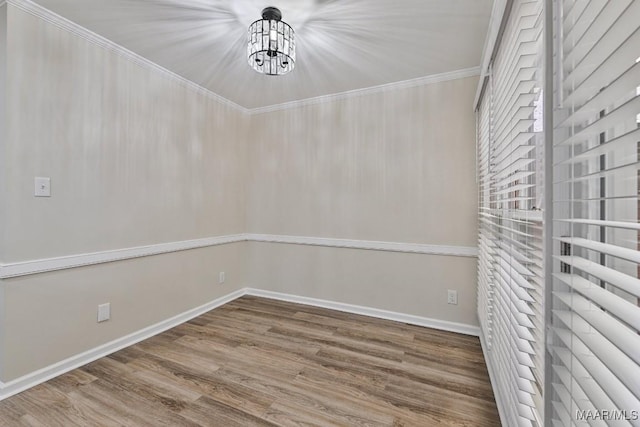 6528 Enfield Mews, Montgomery, AL 36117 - interior space featuring baseboards, a notable chandelier, wood finished floors, and ornamental molding