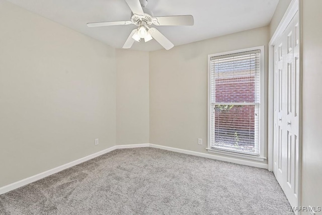 6528 Enfield Mews, Montgomery, AL 36117 - spare room with baseboards, carpet, and a ceiling fan