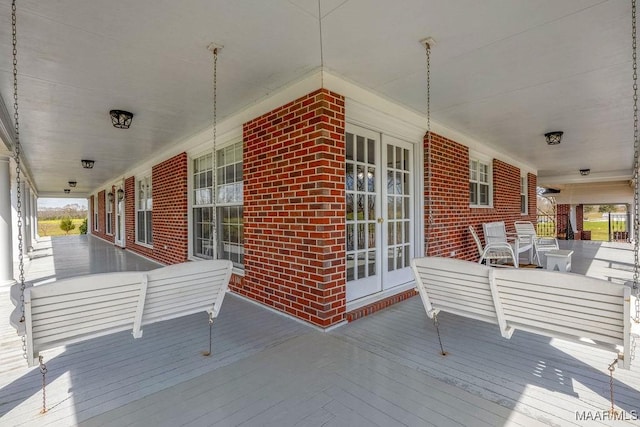 wooden deck with french doors