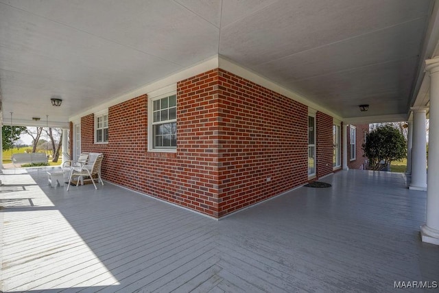 wooden terrace with covered porch