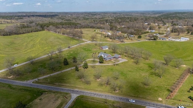 birds eye view of property featuring a rural view