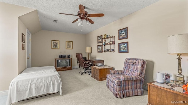 bedroom with a ceiling fan, visible vents, lofted ceiling, a textured ceiling, and light colored carpet