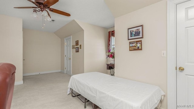 bedroom featuring a ceiling fan, visible vents, and baseboards