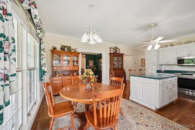 13650 County Road 29th Rd, Clanton, AL 35045 - dining room featuring wood finished floors, crown molding, a chandelier, and ceiling fan