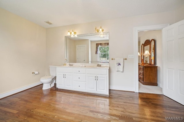 13650 County Road 29th Rd, Clanton, AL 35045 - bathroom featuring double vanity and wood finished floors