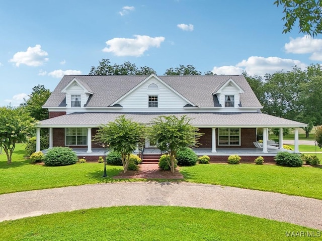 13650 County Road 29th Rd, Clanton, AL 35045 - view of front of property featuring covered porch, brick siding, a front yard, and a shingled roof