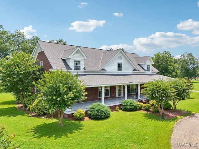 13650 County Road 29th Rd, Clanton, AL 35045 - view of front of house featuring a front lawn, a porch, and roof with shingles
