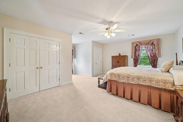 13650 County Road 29th Rd, Clanton, AL 35045 - carpeted bedroom featuring a textured ceiling and ceiling fan