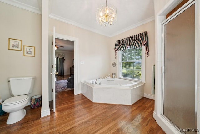 13650 County Road 29th Rd, Clanton, AL 35045 - bathroom with wood finished floors, a shower stall, a bath, ornamental molding, and a chandelier