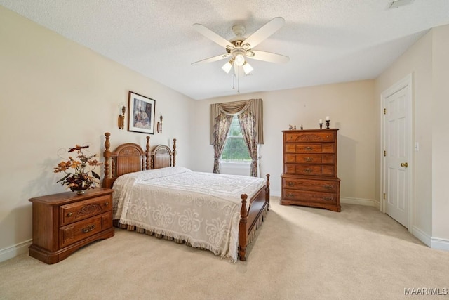 13650 County Road 29th Rd, Clanton, AL 35045 - bedroom with light carpet, ceiling fan, and a textured ceiling