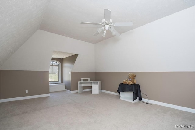 1605 Guiding Way Ln, Prattville, AL 36067 - additional living space with lofted ceiling, carpet flooring, ceiling fan, baseboards, and a textured ceiling