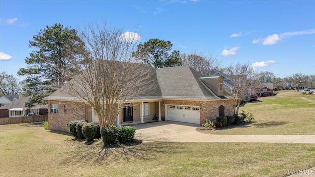 1605 Guiding Way Ln, Prattville, AL 36067 - view of side of home featuring an attached garage, concrete driveway, brick siding, and covered porch