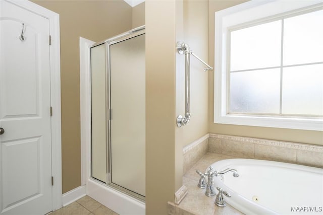 1605 Guiding Way Ln, Prattville, AL 36067 - bathroom with a shower stall, a bath, and tile patterned floors