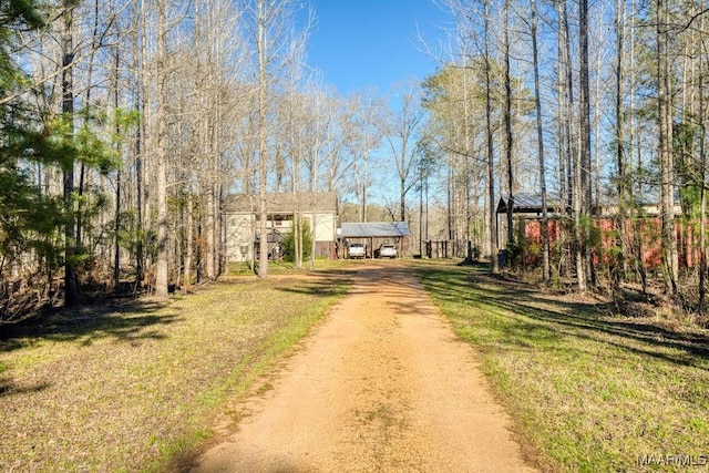 view of road with driveway