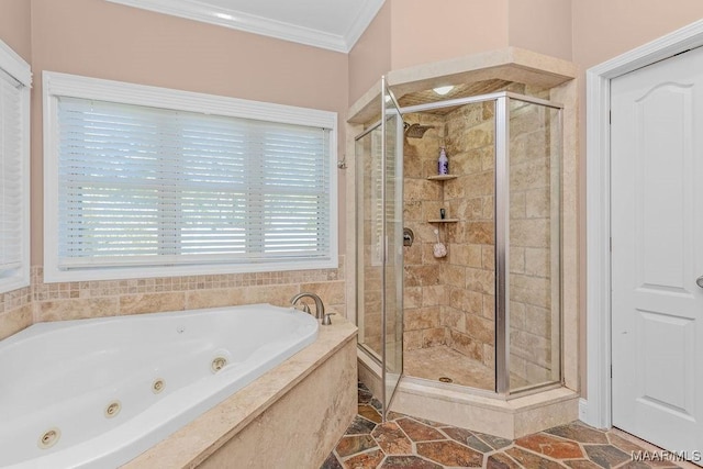 bathroom with a tub with jets, a stall shower, stone finish flooring, and ornamental molding