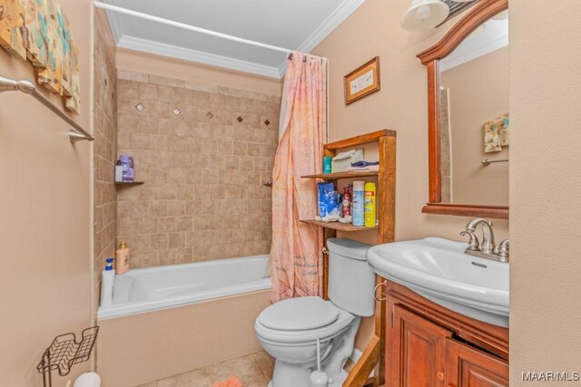 bathroom featuring vanity, toilet, ornamental molding, and shower / bath combo
