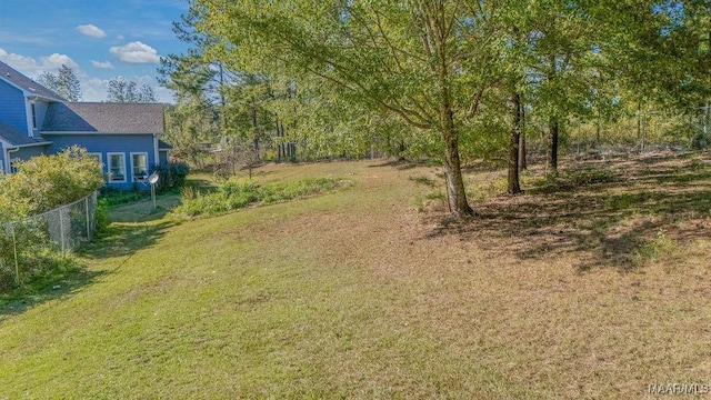 view of yard featuring fence