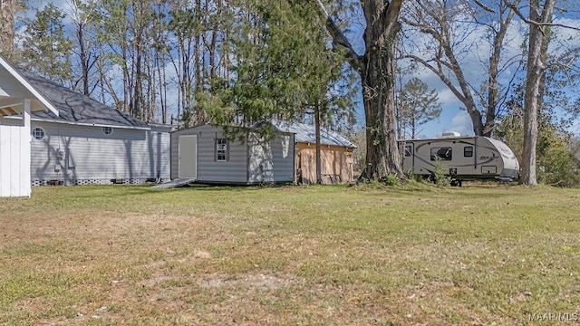 212 N Taylor St, Autaugaville, AL 36067 - view of yard with an outdoor structure and a shed