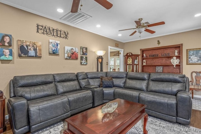 212 N Taylor St, Autaugaville, AL 36067 - living area featuring visible vents, wood finished floors, ceiling fan, and ornamental molding