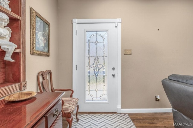 212 N Taylor St, Autaugaville, AL 36067 - foyer with baseboards and wood finished floors
