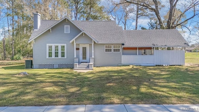212 N Taylor St, Autaugaville, AL 36067 - view of front facade with a chimney, a front lawn, and roof with shingles