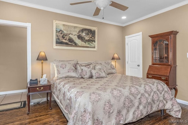 212 N Taylor St, Autaugaville, AL 36067 - bedroom with visible vents, wood finished floors, baseboards, and ornamental molding