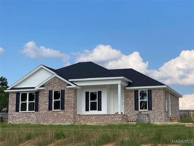 20 Autumn Trail Cir, Wetumpka, AL 36092 - view of front of house with brick siding, central AC unit, and roof with shingles